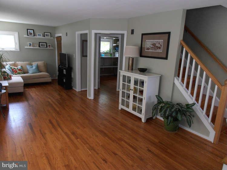 6814 Quander Road Alexandria, VA 22307 - Photo 3 of 16 a view of livingroom with furniture and wooden floor