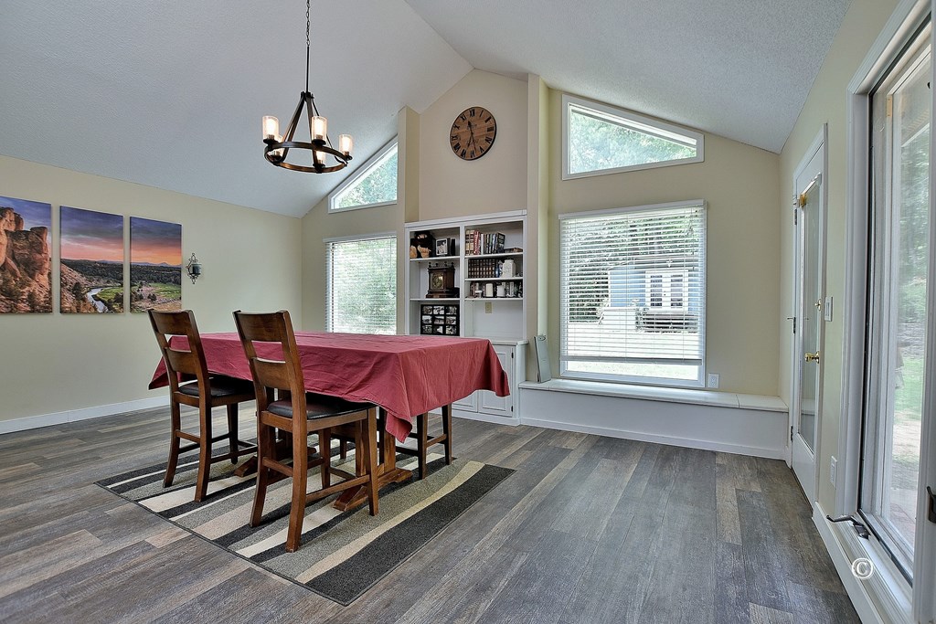 420 Cheyenne Road Columbus, GA 31904 - Photo 6 of 31 Dining area with views of backyard. Benches w stor
