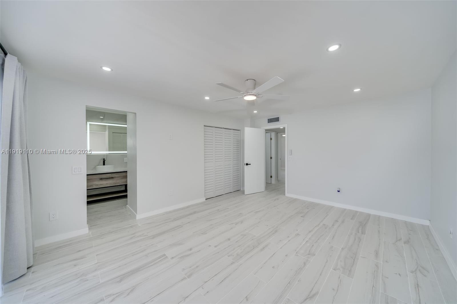 4155 Southwest 66th Terrace, Unit 104 Davie, FL 33314 - Photo 16 of 25 a view of empty room with wooden floor