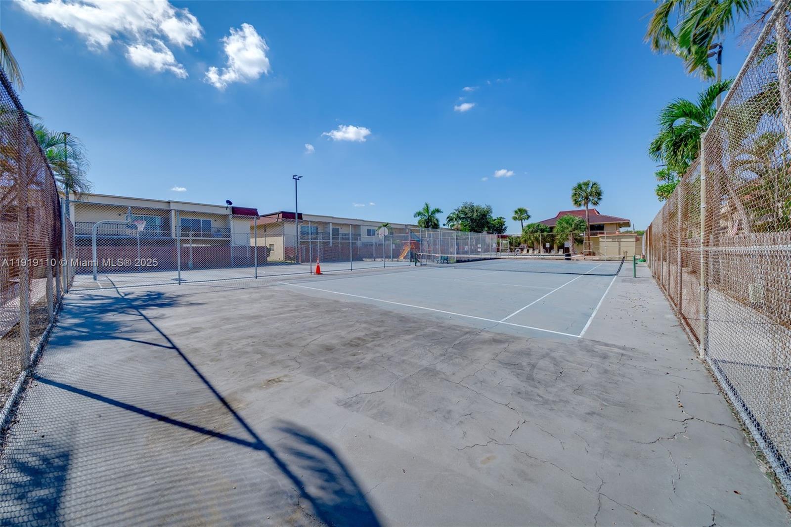 4155 Southwest 66th Terrace, Unit 104 Davie, FL 33314 - Photo 22 of 25 a view of a backyard of a house