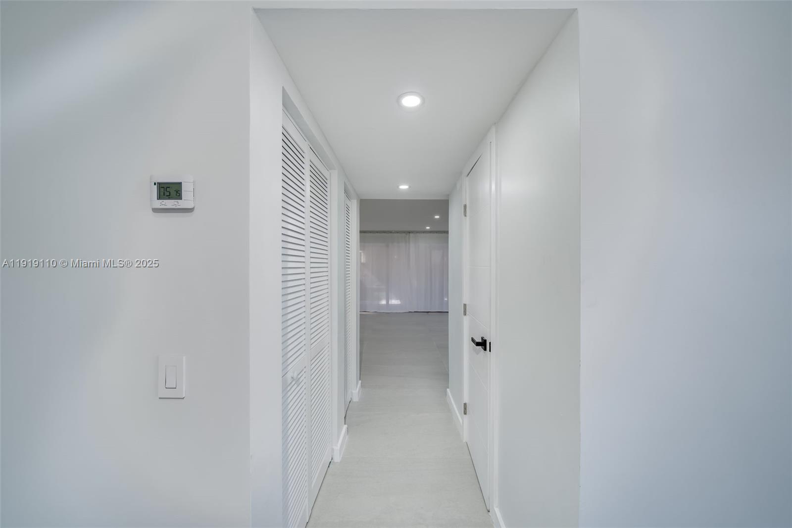 4155 Southwest 66th Terrace, Unit 104 Davie, FL 33314 - Photo 6 of 25 a view of a hallway with an entryway