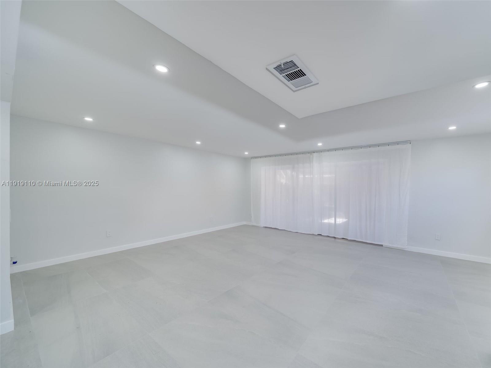 4155 Southwest 66th Terrace, Unit 104 Davie, FL 33314 - Photo 8 of 25 an empty room with a empty space