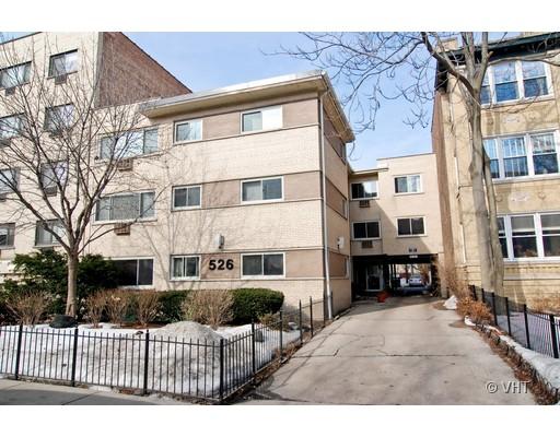 526 West Roscoe Street, Unit 1D Chicago, IL 60657 - Photo 1 of 1 a view of a house with a yard