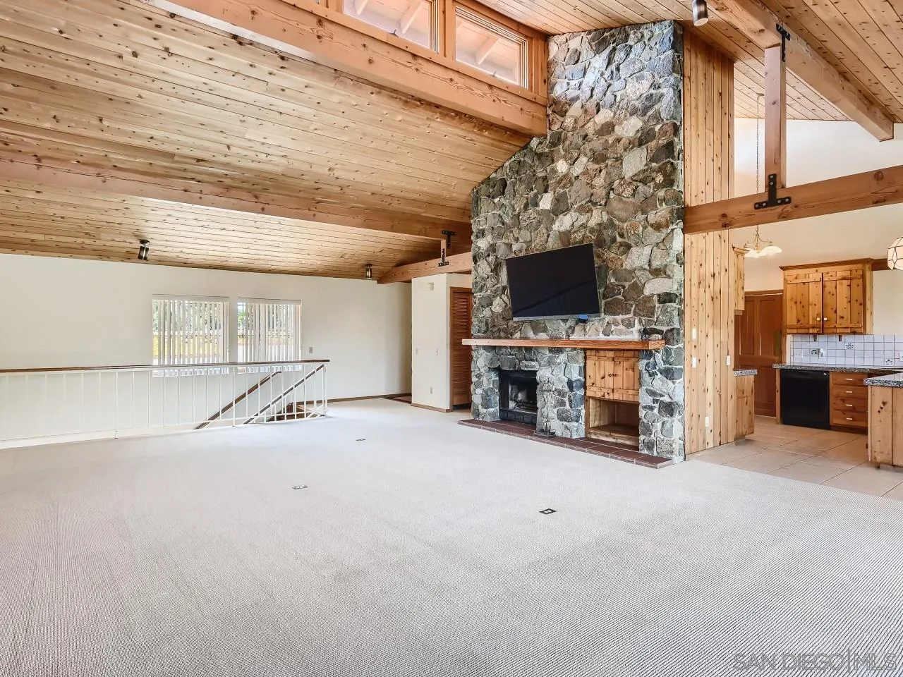 16363 Espola Road Poway, CA 92064 - Photo 8 of 43 a view of a livingroom with furniture and a fireplace