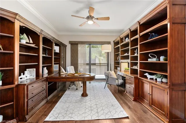 a reading room with furniture and a book shelf