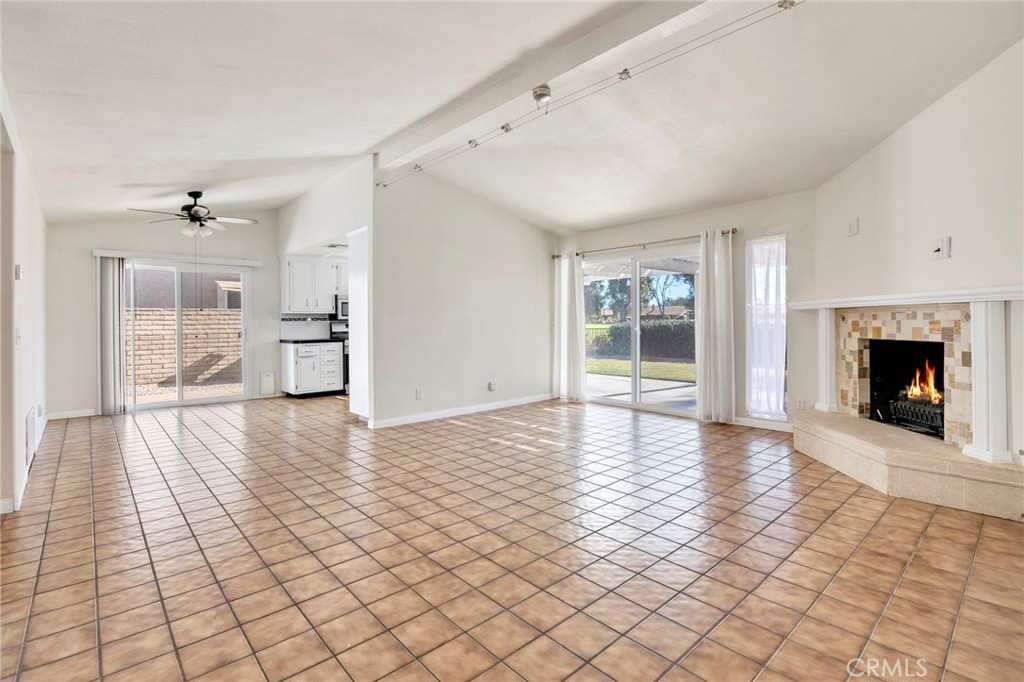 2125 Silver Oak Way Hemet, CA 92545 - Photo 7 of 40 a view of an empty room with window and fire place