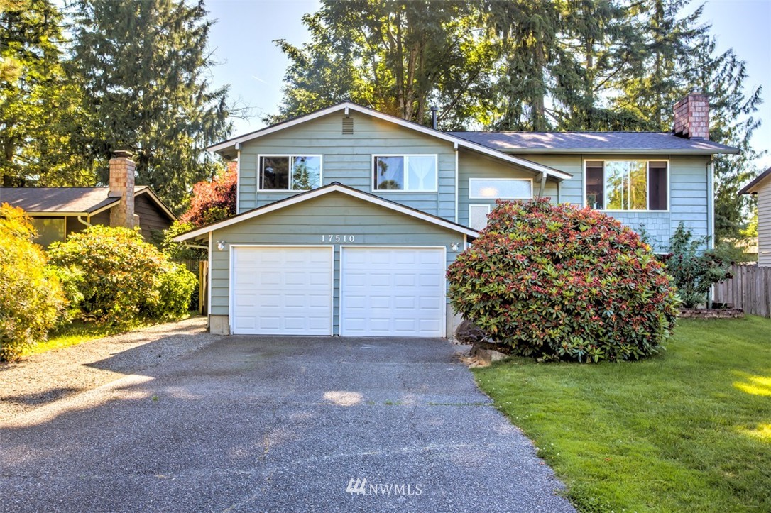 17510 24th Avenue Southeast Bothell, WA 98012 - Photo 1 of 20 a view of a house with a yard and potted plants