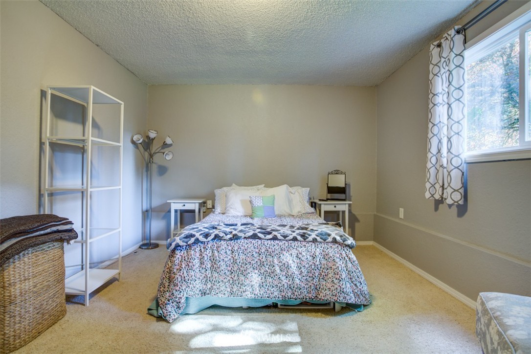 17510 24th Avenue Southeast Bothell, WA 98012 - Photo 13 of 20 a bedroom with a bed and with furniture