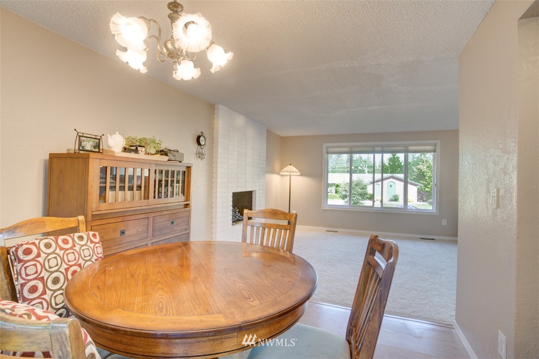 17510 24th Avenue Southeast Bothell, WA 98012 - Photo 5 of 20 a view of a dining room with furniture window and outside view