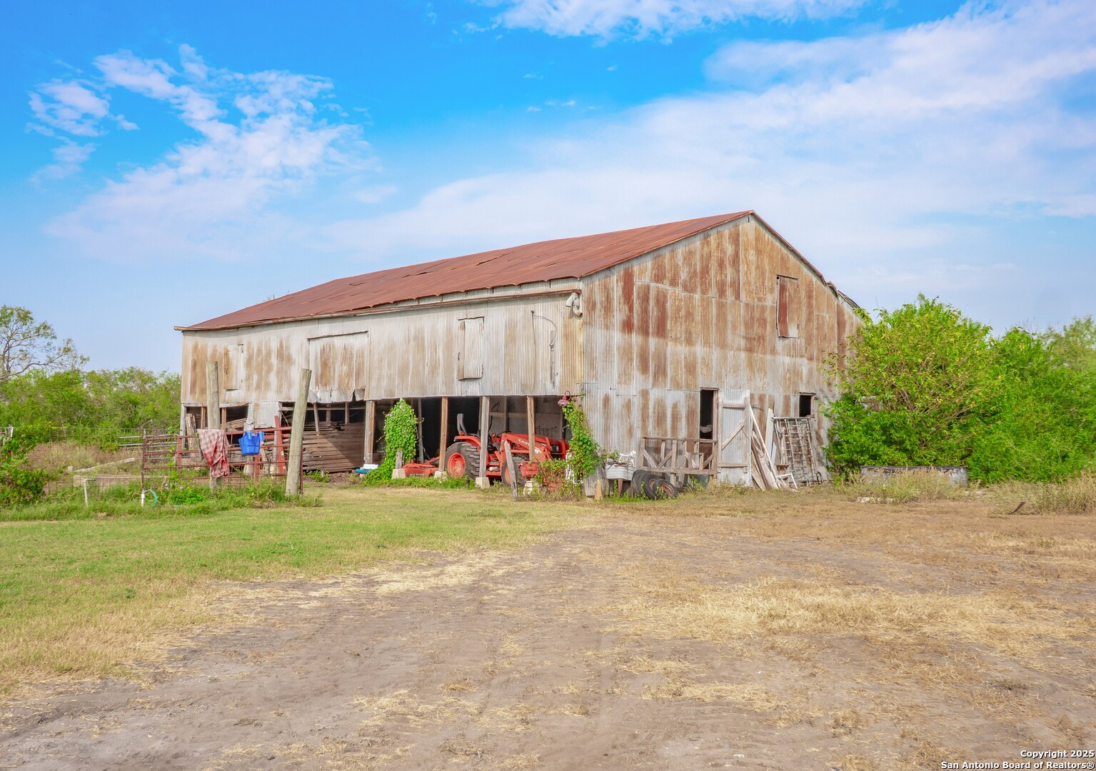 6147 Pfeil Road Schertz, TX 78154 - Photo 35 of 47 a view of a house with backyard and trees