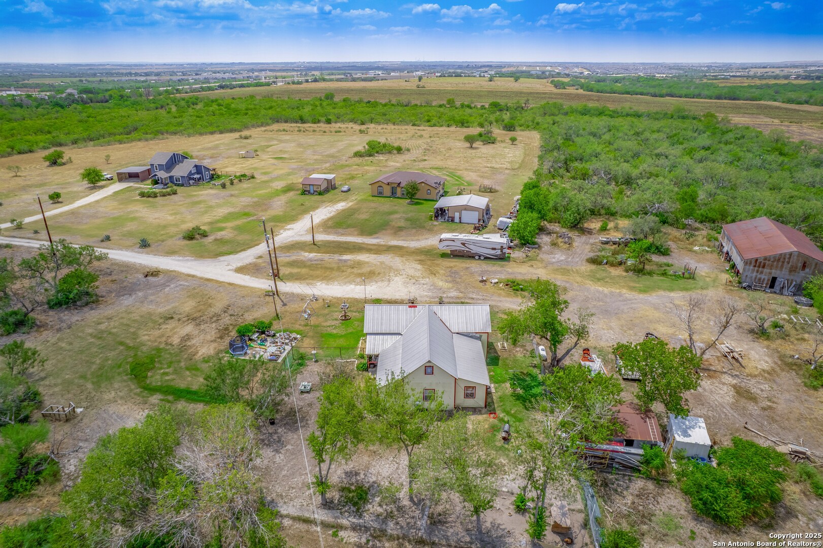 6147 Pfeil Road Schertz, TX 78154 - Photo 46 of 47 an aerial view of residential houses with outdoor space