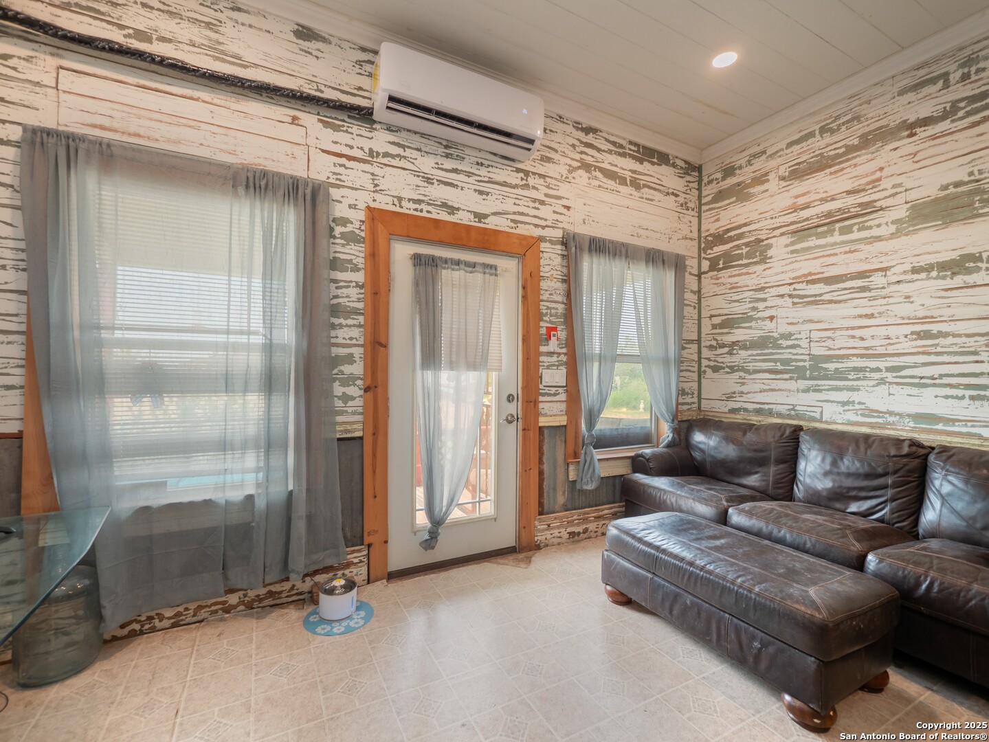 6147 Pfeil Road Schertz, TX 78154 - Photo 7 of 47 a living room with furniture and a ceiling fan