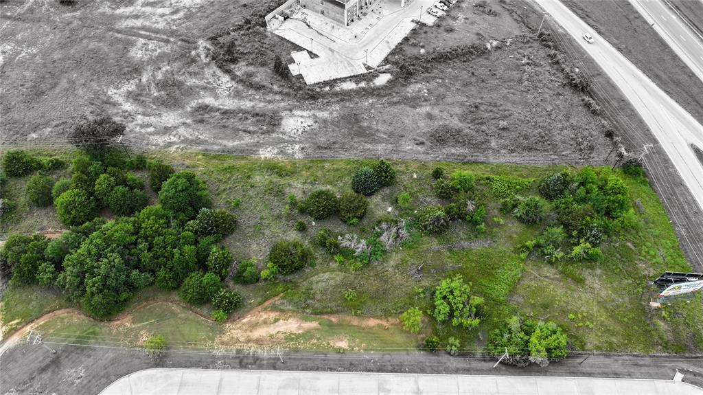 287 South Access Road Bowie, TX 76230 - Photo 15 of 20 a view of a yard with plants