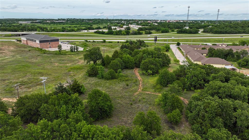 287 South Access Road Bowie, TX 76230 - Photo 7 of 20 a view of a lake with a big yard
