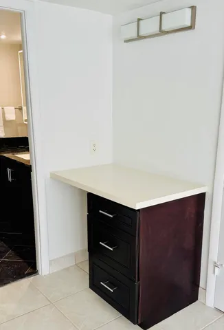 a view of a room with racks on the wall