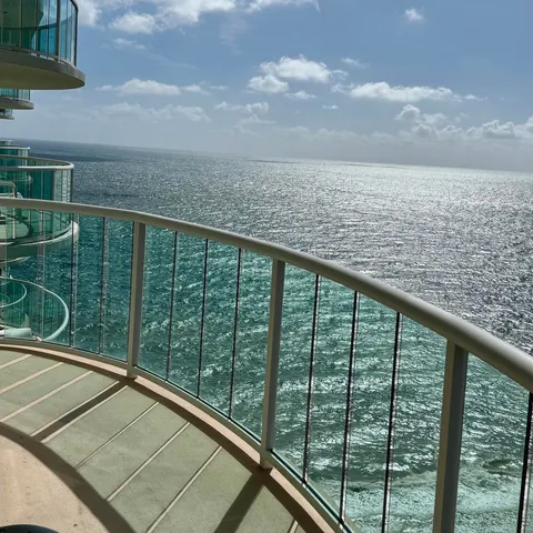 a view of balcony with ocean view