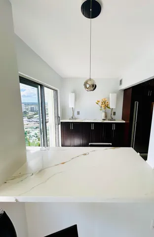 a view of furniture and window in a room