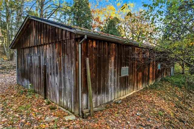 a view of outdoor space with wooden fence