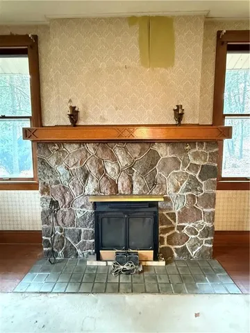a living room with large windows