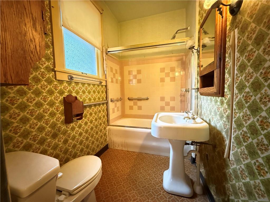 729 East Lake Road Transfer, PA 16154 - Photo 37 of 50 a bathroom with a sink toilet and shower