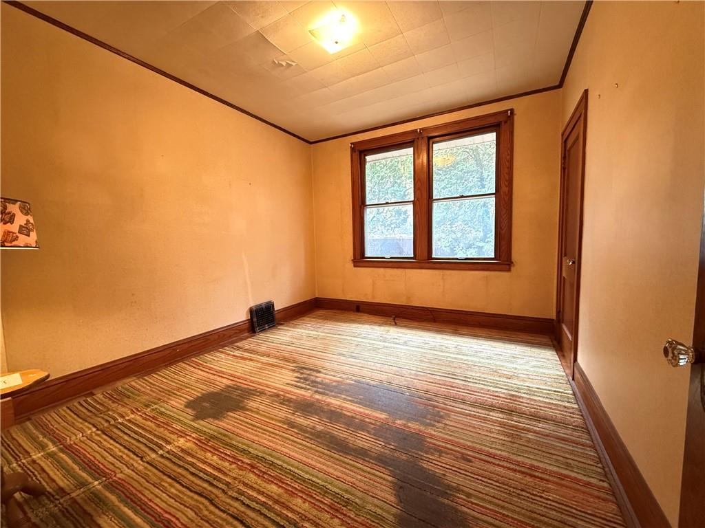 729 East Lake Road Transfer, PA 16154 - Photo 39 of 50 a view of an empty room with a window and wooden floor