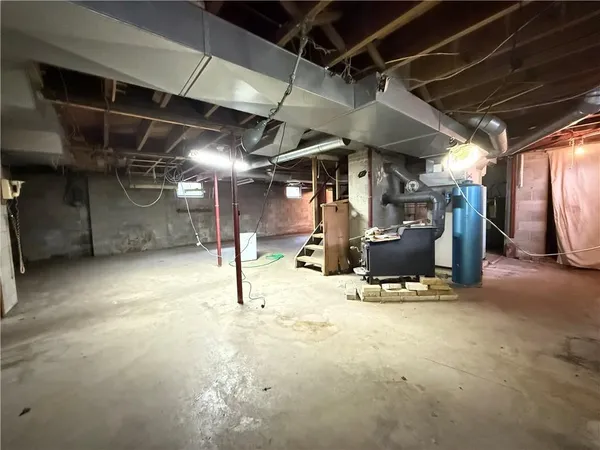 a room with gym equipment and a mirror