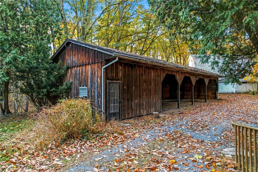 729 East Lake Road Transfer, PA 16154 - Photo 9 of 50 a backyard of a house with lots of green space