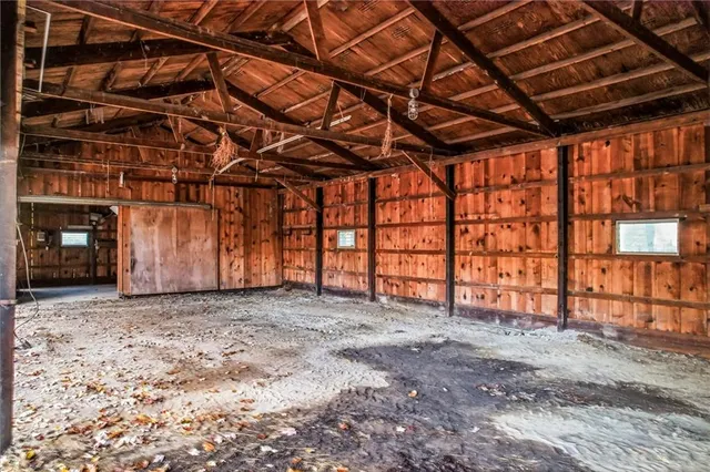a view of a room with wooden walls