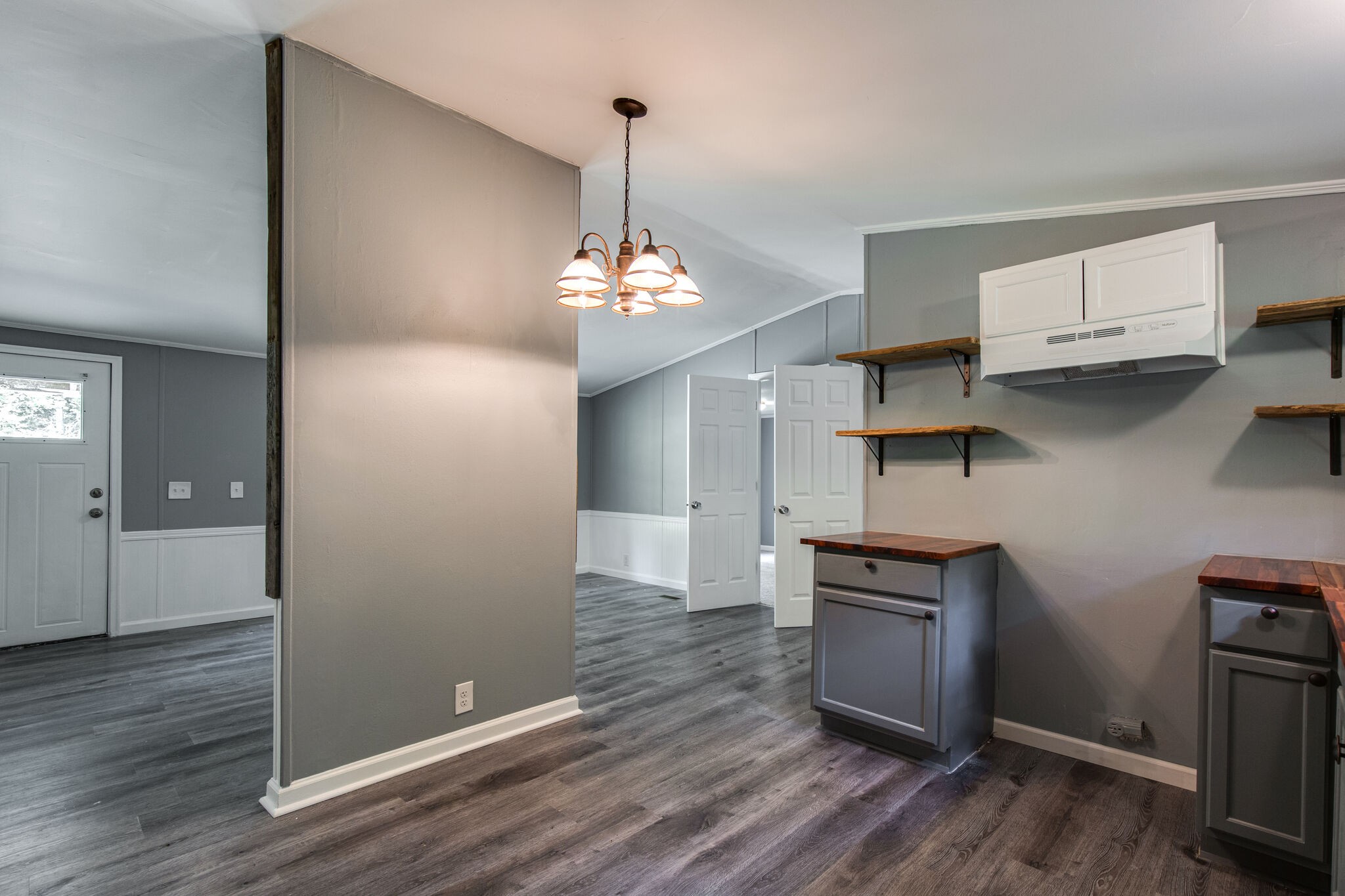 6571 Wesley Ridge Road Lyles, TN 37098 - Photo 14 of 23 a view of a kitchen with stainless steel appliances granite countertop a sink and wooden floor