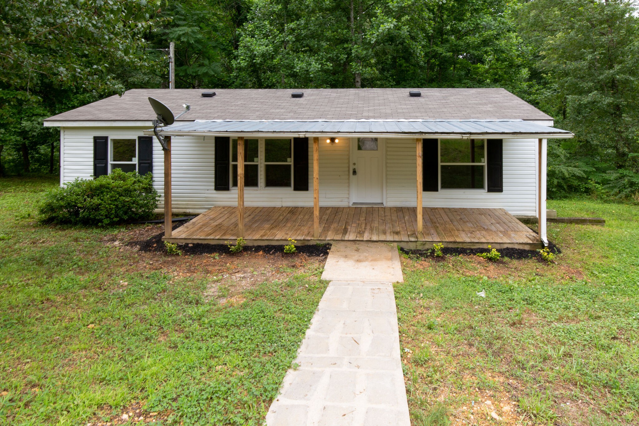 6571 Wesley Ridge Road Lyles, TN 37098 - Photo 3 of 23 a front view of a house with a yard