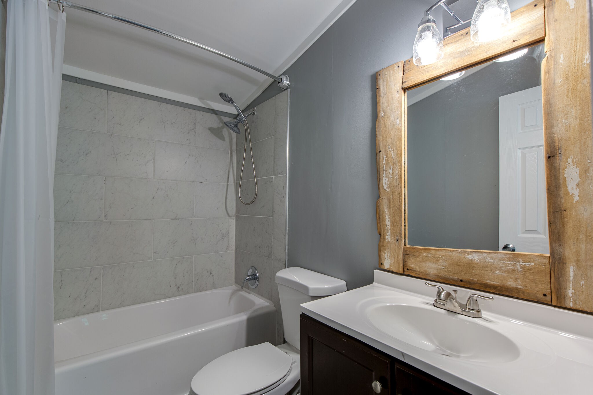 6571 Wesley Ridge Road Lyles, TN 37098 - Photo 22 of 23 a bathroom with a sink toilet tub and shower