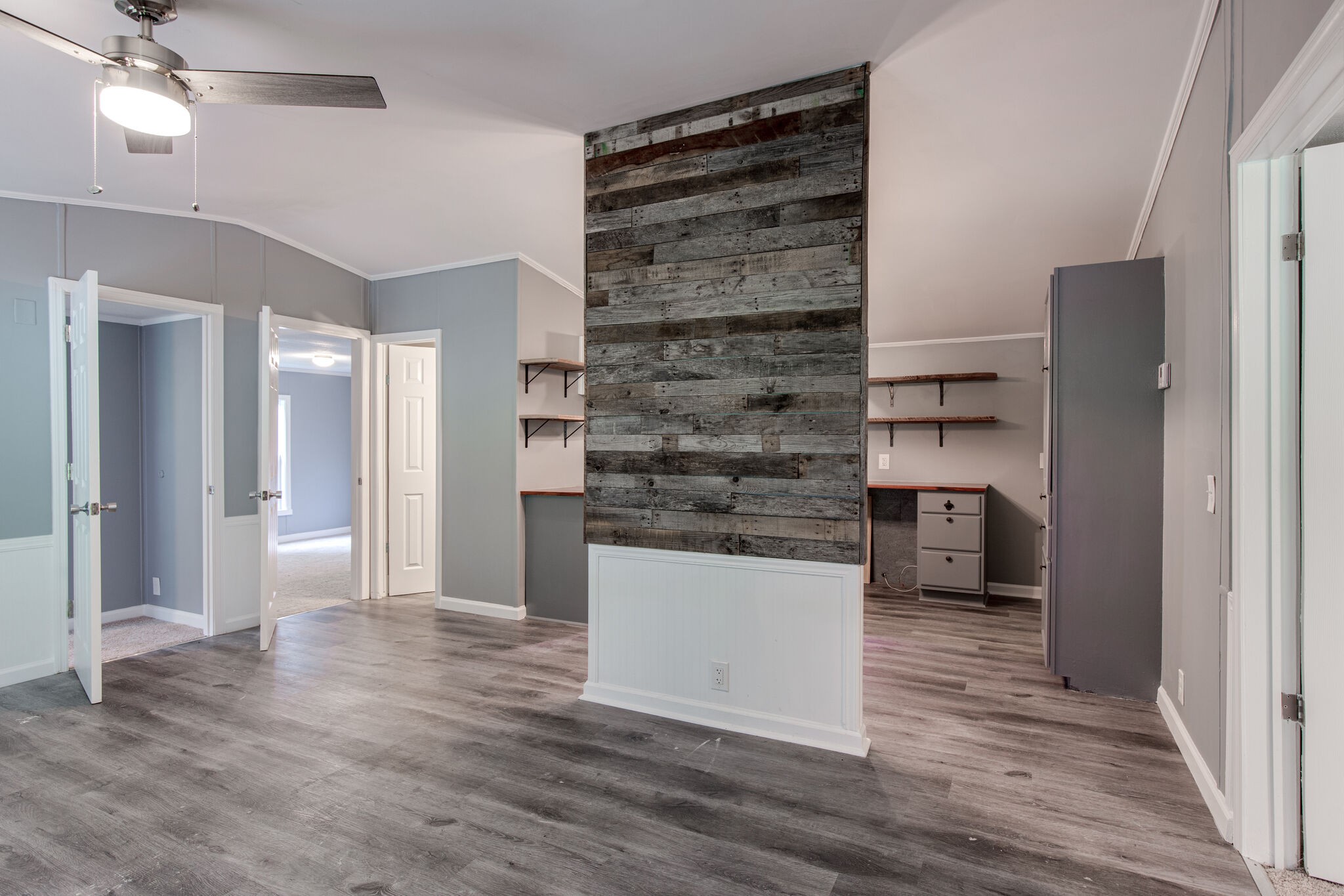6571 Wesley Ridge Road Lyles, TN 37098 - Photo 6 of 23 a kitchen with a refrigerator and a stove top oven