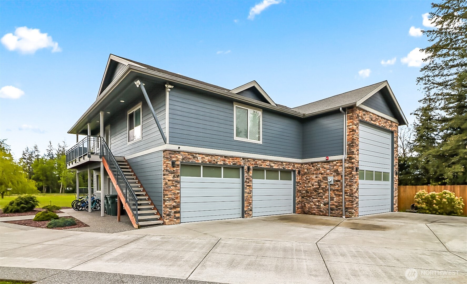 1939 Grandview Road Ferndale, WA 98248 - Photo 2 of 39 a front view of a house with garage
