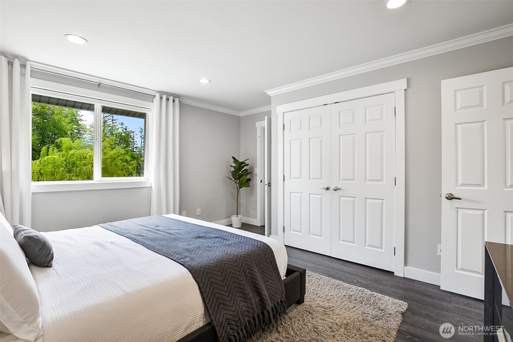 1939 Grandview Road Ferndale, WA 98248 - Photo 24 of 39 a bedroom with a bed and a window