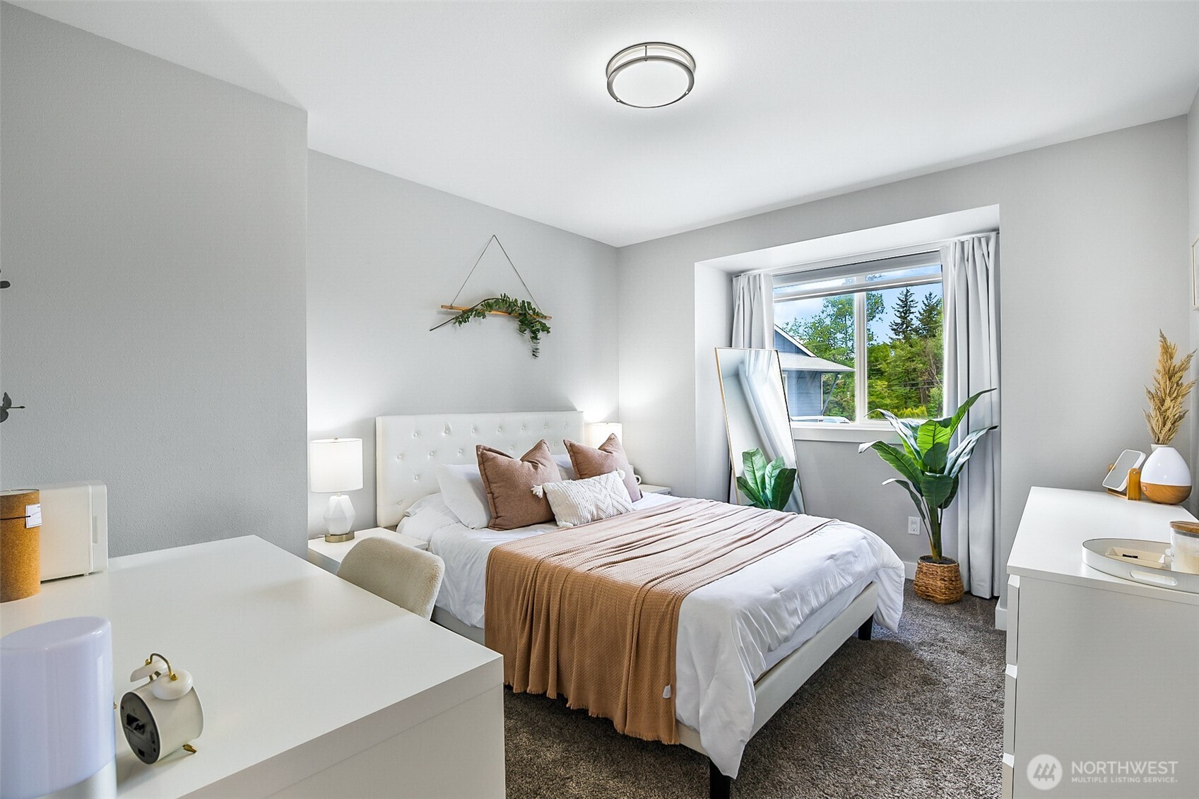 1939 Grandview Road Ferndale, WA 98248 - Photo 30 of 39 a bedroom with a bed and a window