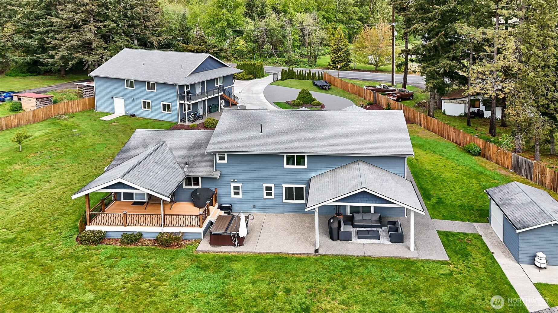 1939 Grandview Road Ferndale, WA 98248 - Photo 3 of 39 an aerial view of a house with swimming pool and big yard
