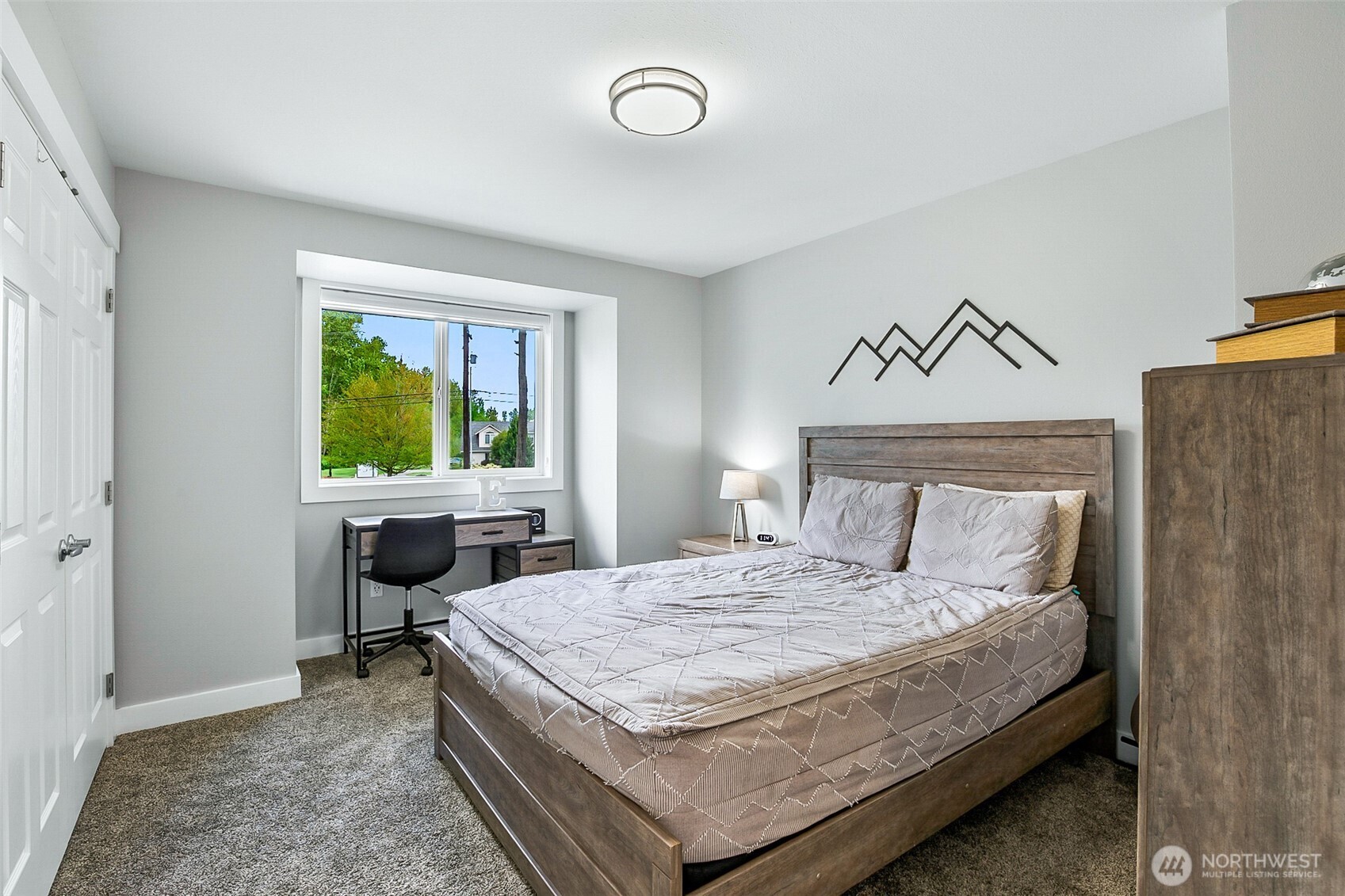 1939 Grandview Road Ferndale, WA 98248 - Photo 31 of 39 a bedroom with a bed and a window