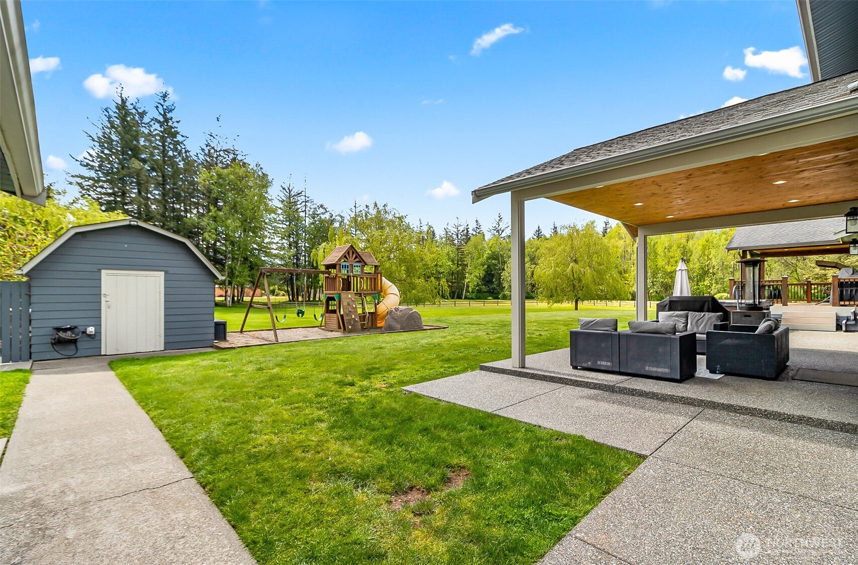 1939 Grandview Road Ferndale, WA 98248 - Photo 32 of 39 a view of a house with backyard and porch
