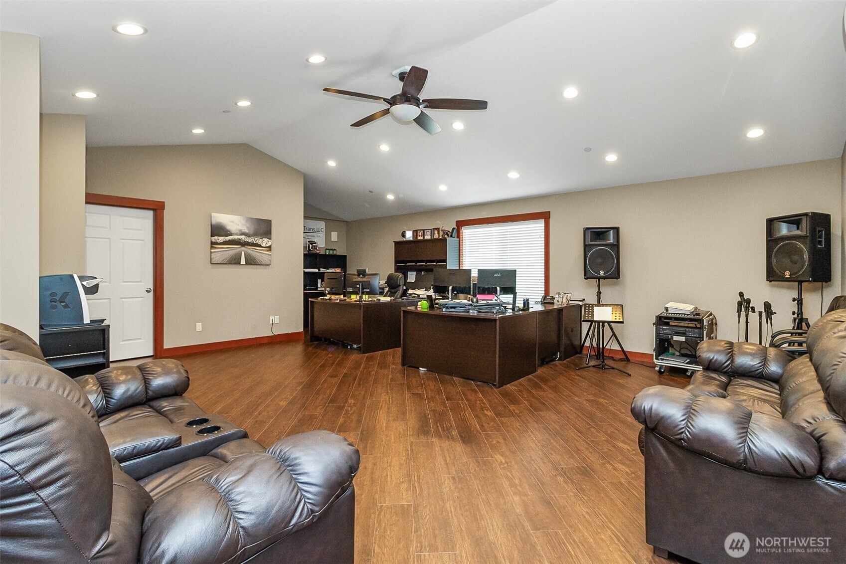 1939 Grandview Road Ferndale, WA 98248 - Photo 36 of 39 a living room with furniture kitchen view and a wooden floor