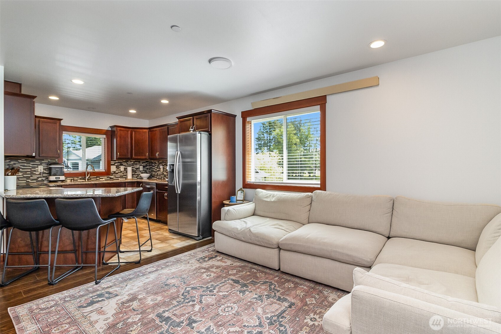 1939 Grandview Road Ferndale, WA 98248 - Photo 37 of 39 a living room with furniture and a dining table with kitchen view