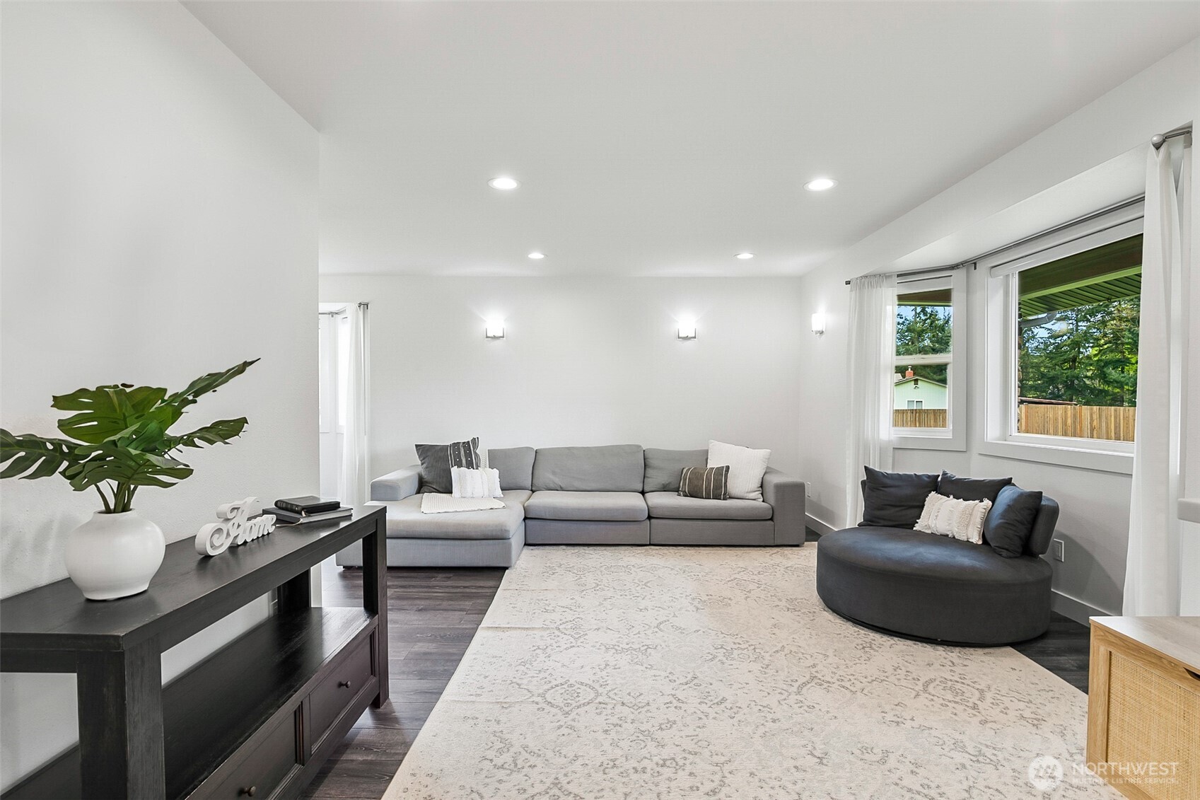1939 Grandview Road Ferndale, WA 98248 - Photo 8 of 39 a living room with furniture and a potted plant