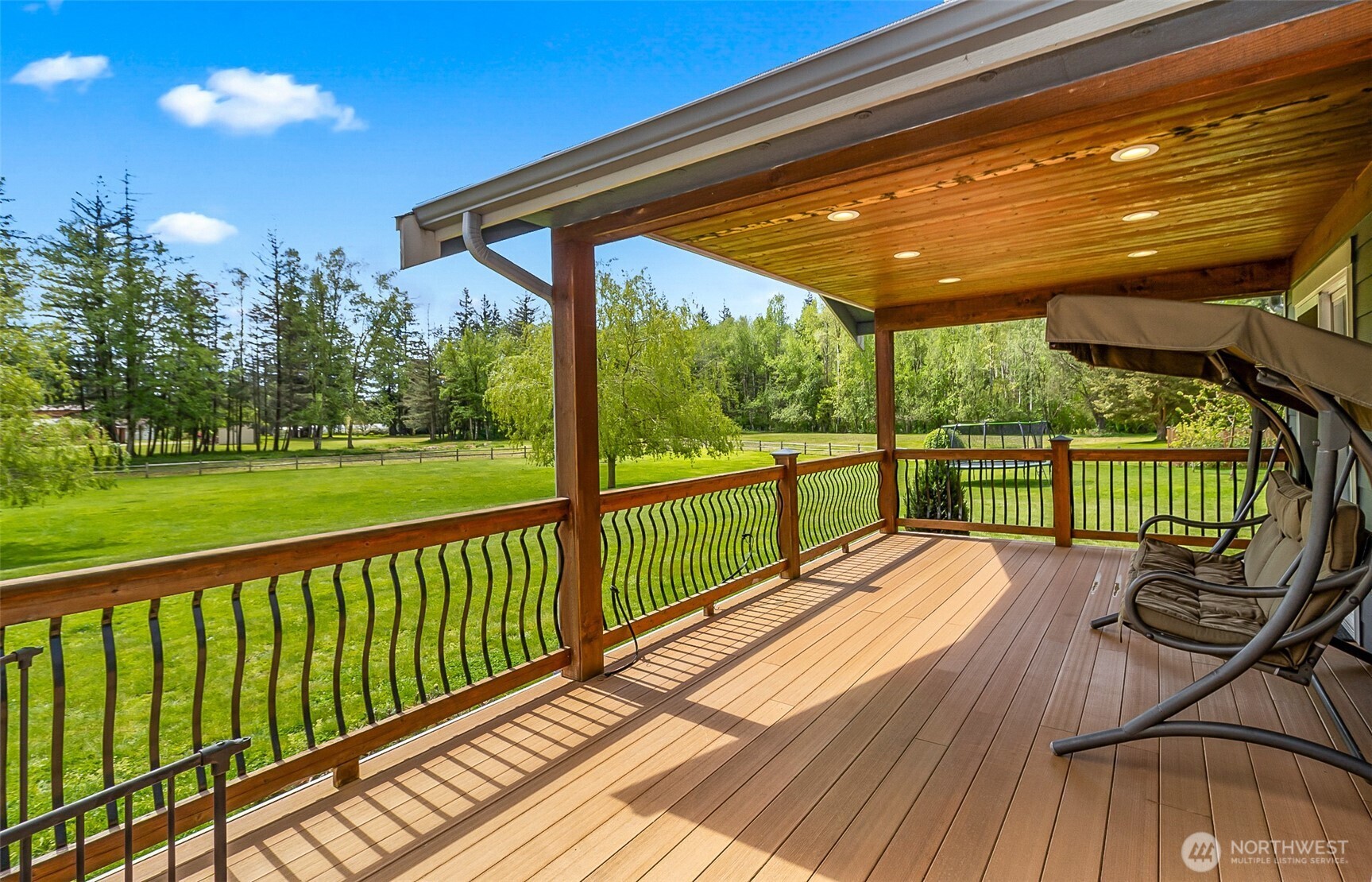1939 Grandview Road Ferndale, WA 98248 - Photo 10 of 39 a view of balcony with wooden floor and outdoor space