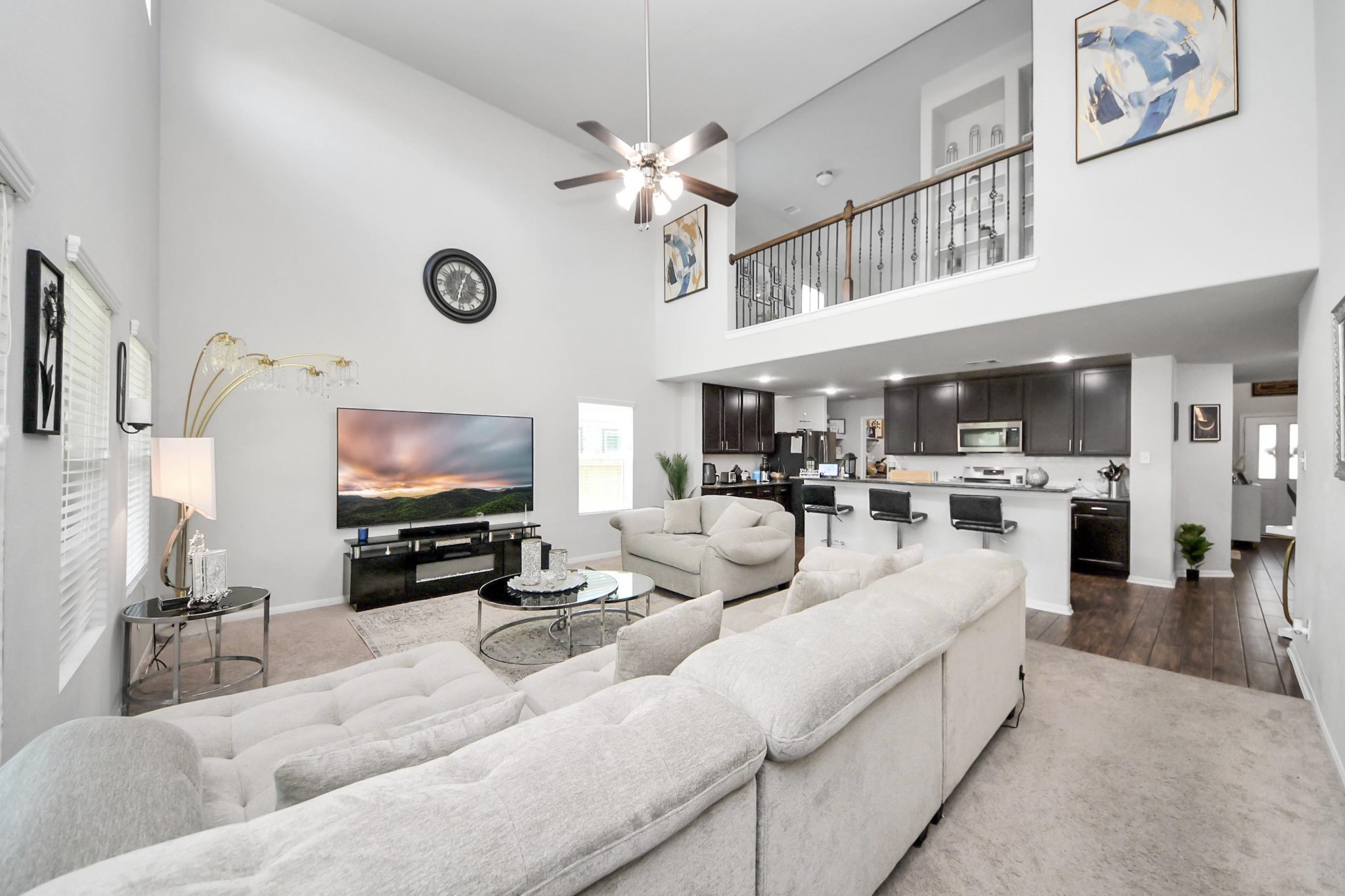 2643 Ridgeback Drive Rosenberg, TX 77471 - Photo 21 of 46 a living room with furniture a flat screen tv and kitchen view