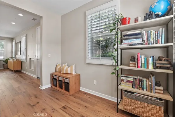 a room with furniture and a book shelf