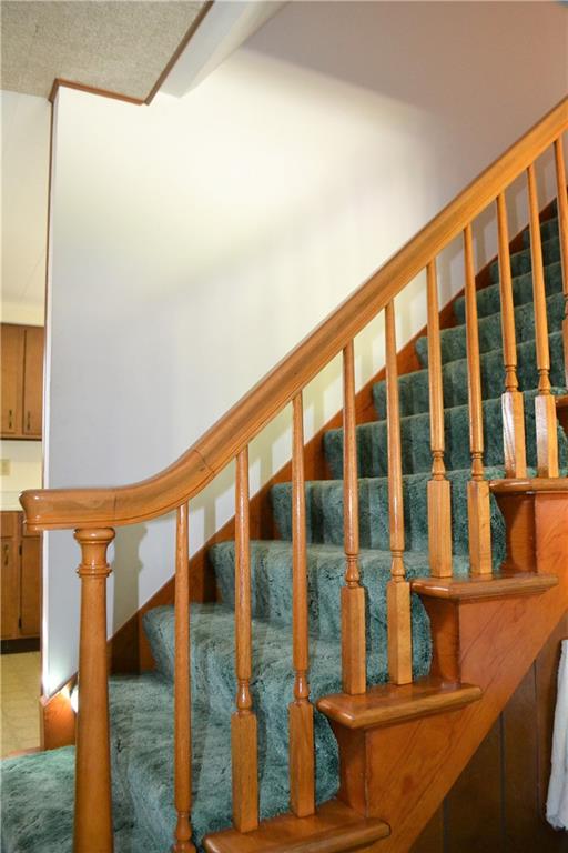 922 Main Street East Rural Valley, PA 16249 - Photo 8 of 20 a view of staircase with large windows