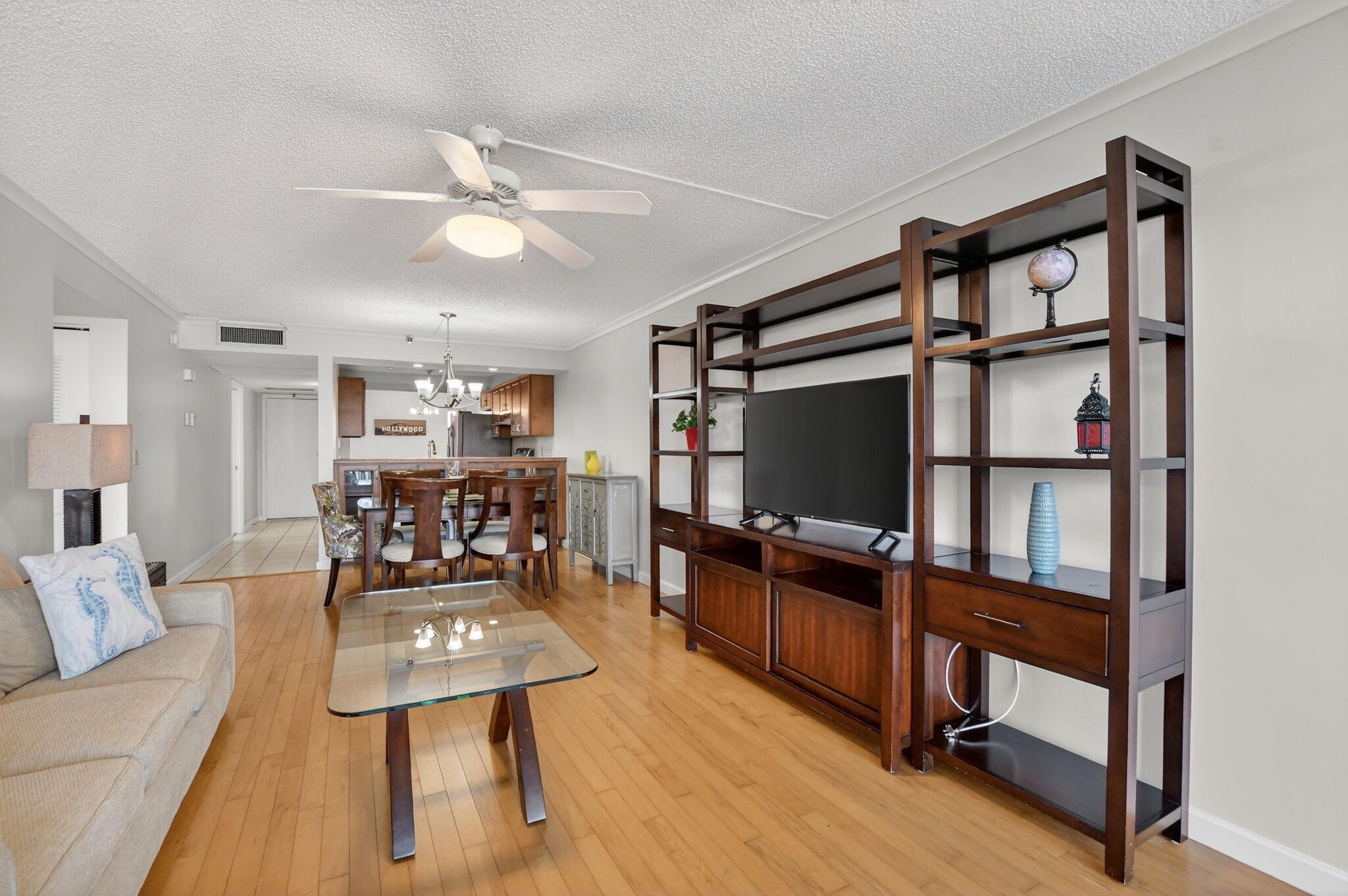 20 Royal Palm Way, Unit 602 Boca Raton, FL 33432 - Photo 12 of 56 a view of a livingroom with furniture and a flat screen tv