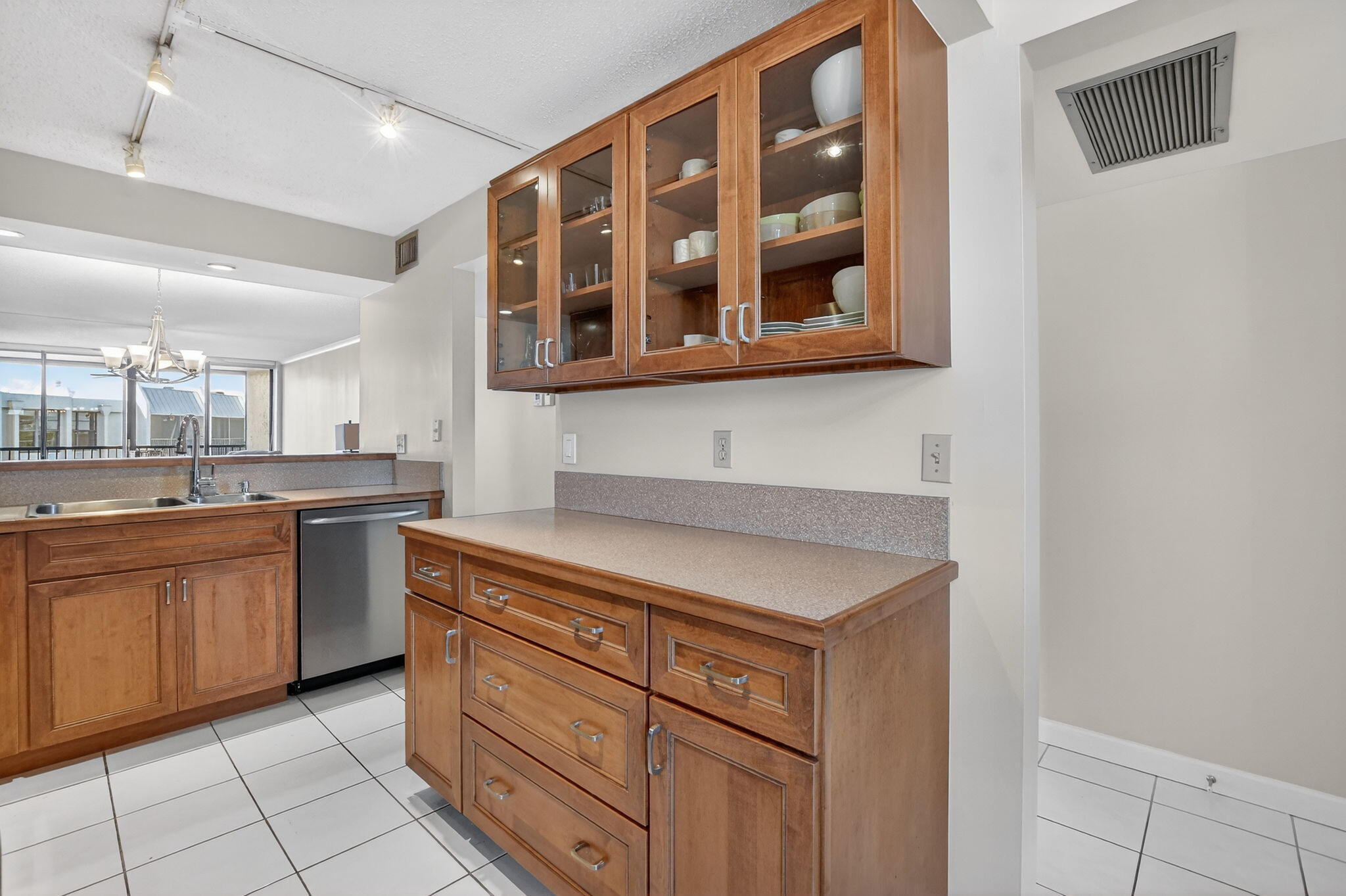 20 Royal Palm Way, Unit 602 Boca Raton, FL 33432 - Photo 16 of 56 a kitchen with a cabinets and appliances