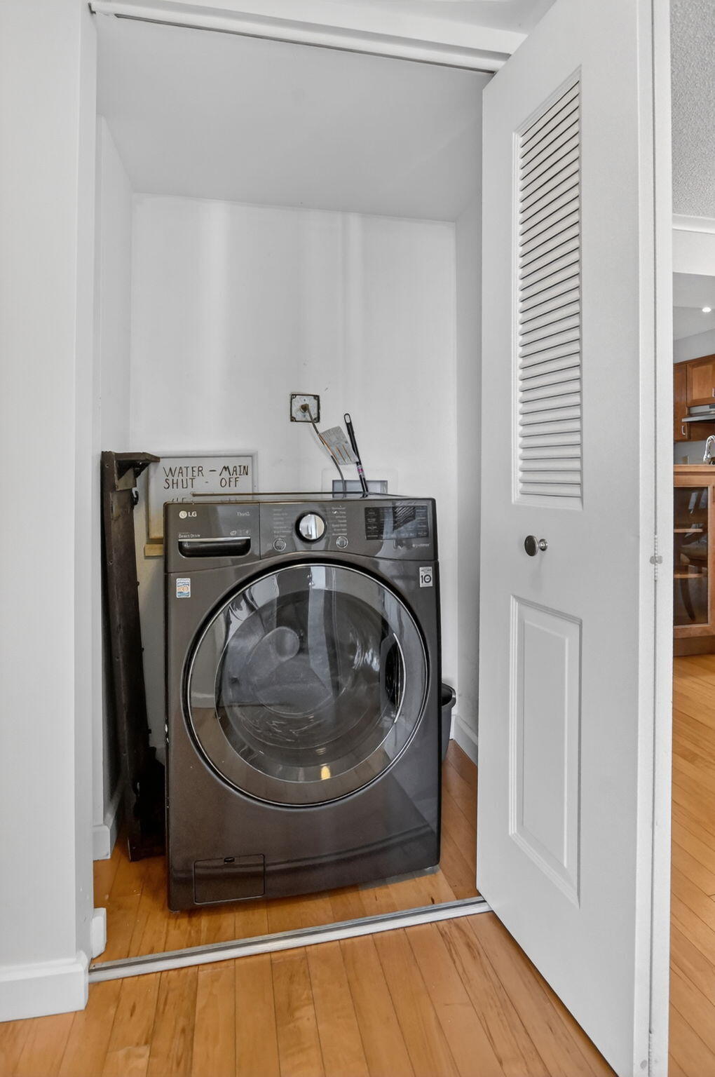 20 Royal Palm Way, Unit 602 Boca Raton, FL 33432 - Photo 22 of 56 a utility room with washing machine