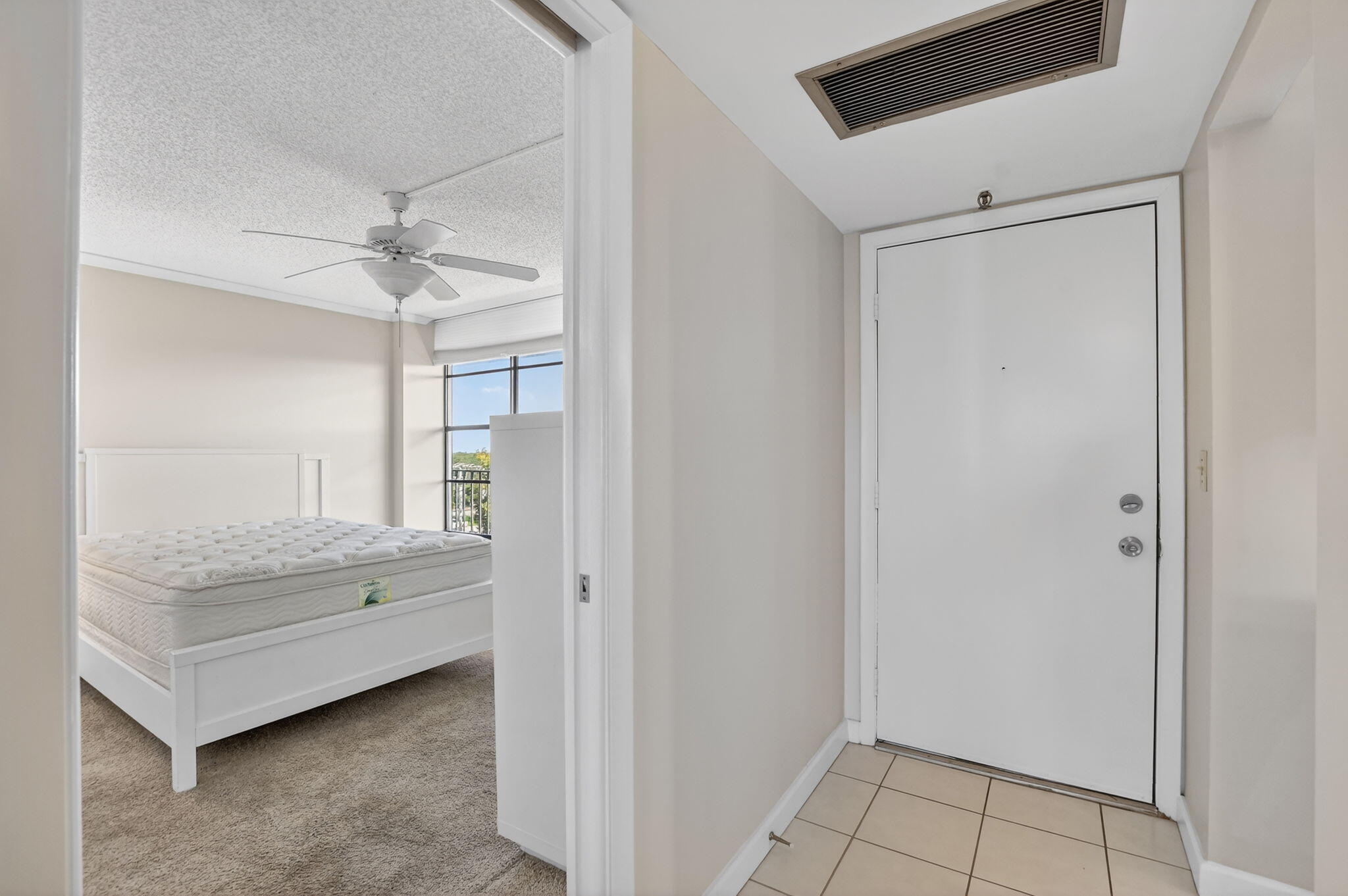 20 Royal Palm Way, Unit 602 Boca Raton, FL 33432 - Photo 3 of 56 a bathroom with a sink a mirror and a shower