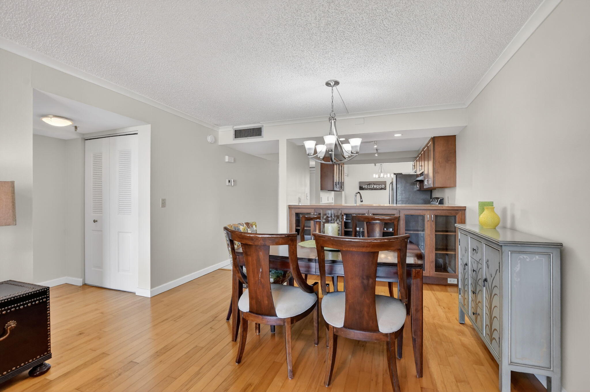 20 Royal Palm Way, Unit 602 Boca Raton, FL 33432 - Photo 8 of 56 a view of a dining room with furniture and wooden floor